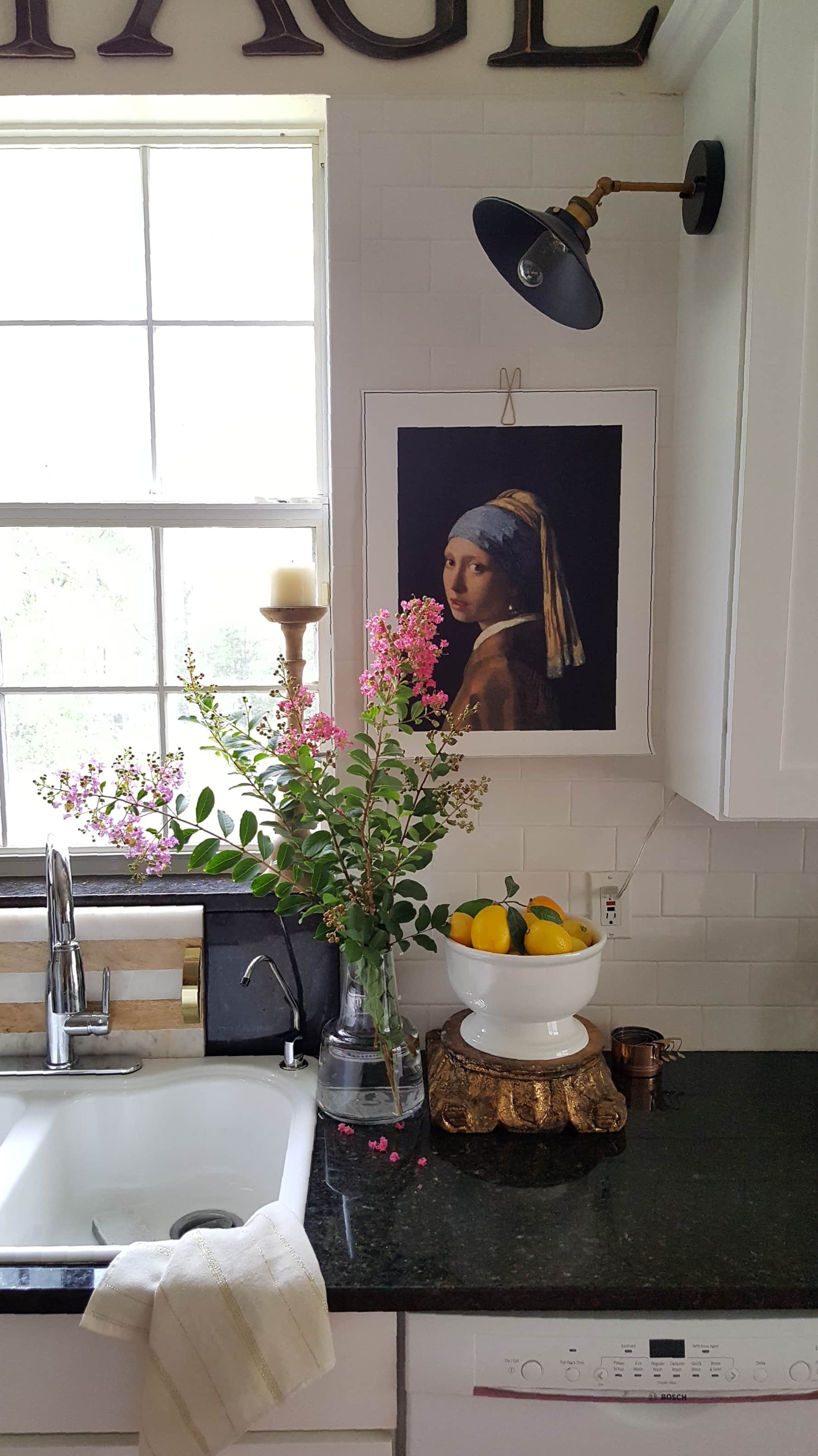 Beesnburlap Summer home blog tour brass chandelier flowers herbs modern farmhouse rustic vintage white kitchen decor copper pots open shelving wood rack chandelier Scandinavian design