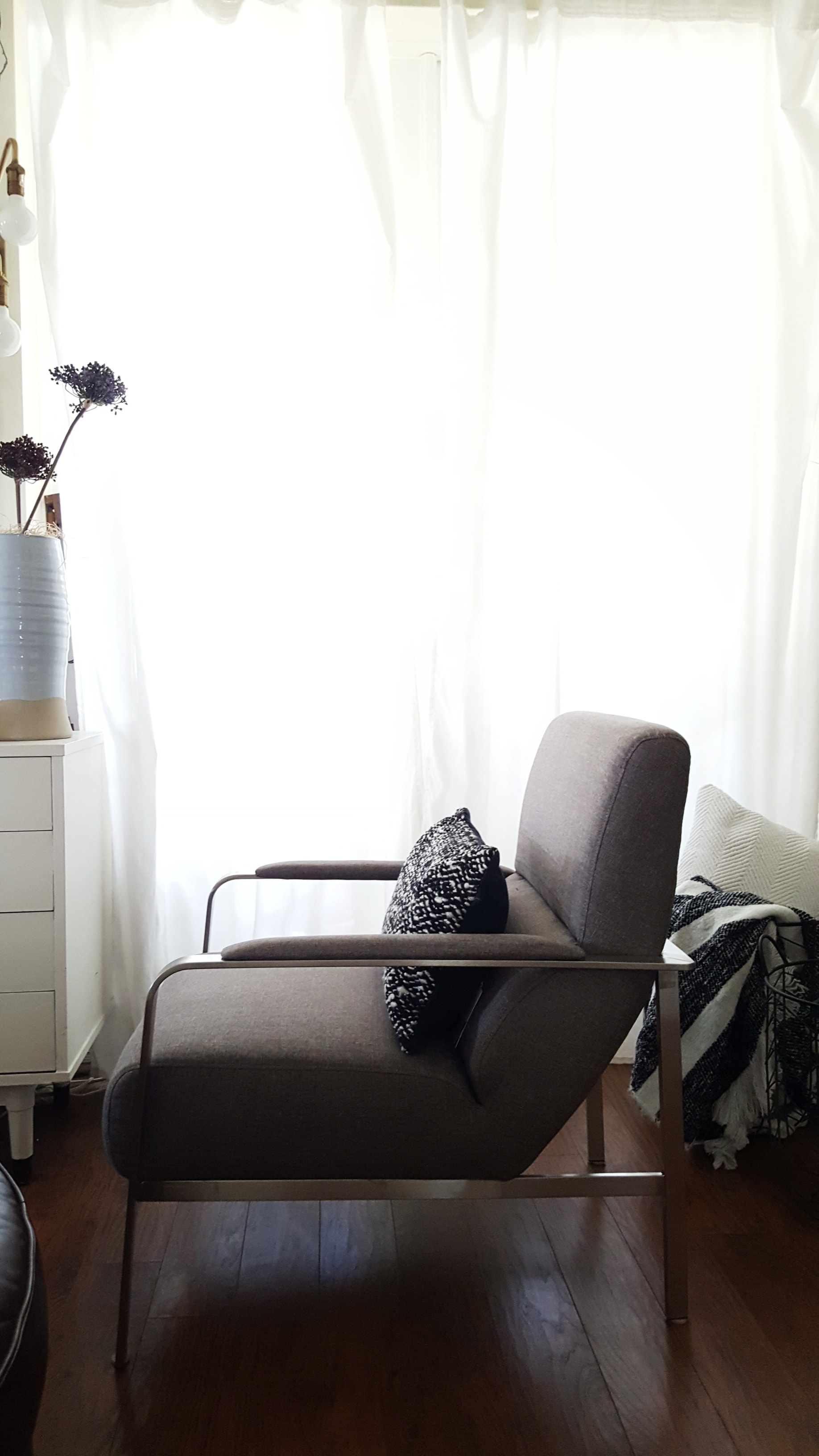 Mid Century Modern Eclectic Vintage Industrial decor design inspiration living room makeover furniture home decorating bed bath & beyond black and white decor minimal design metal vase flowers