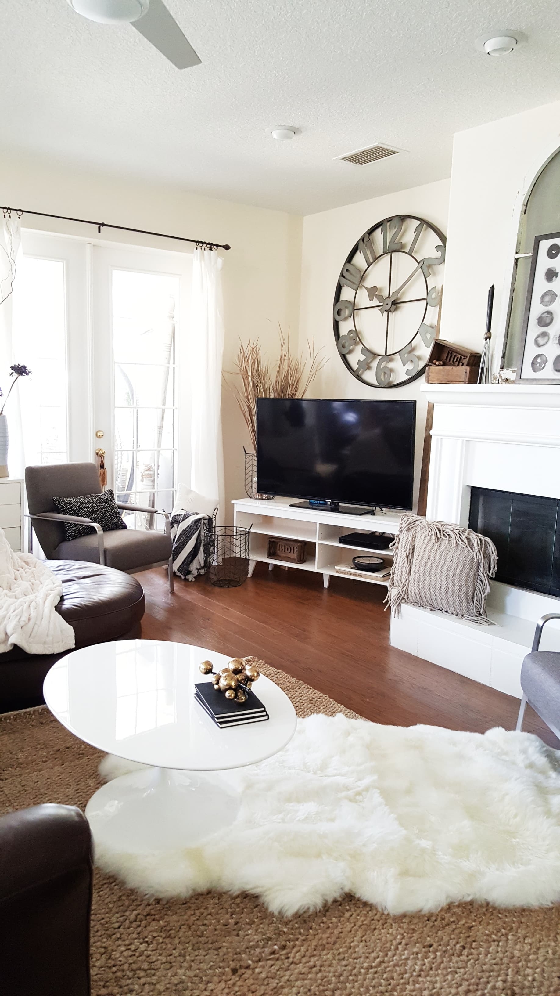 Mid Century Modern Eclectic Vintage Industrial decor design inspiration living room makeover furniture home decorating bed bath & beyond black and white decor minimal design metal vase flowers