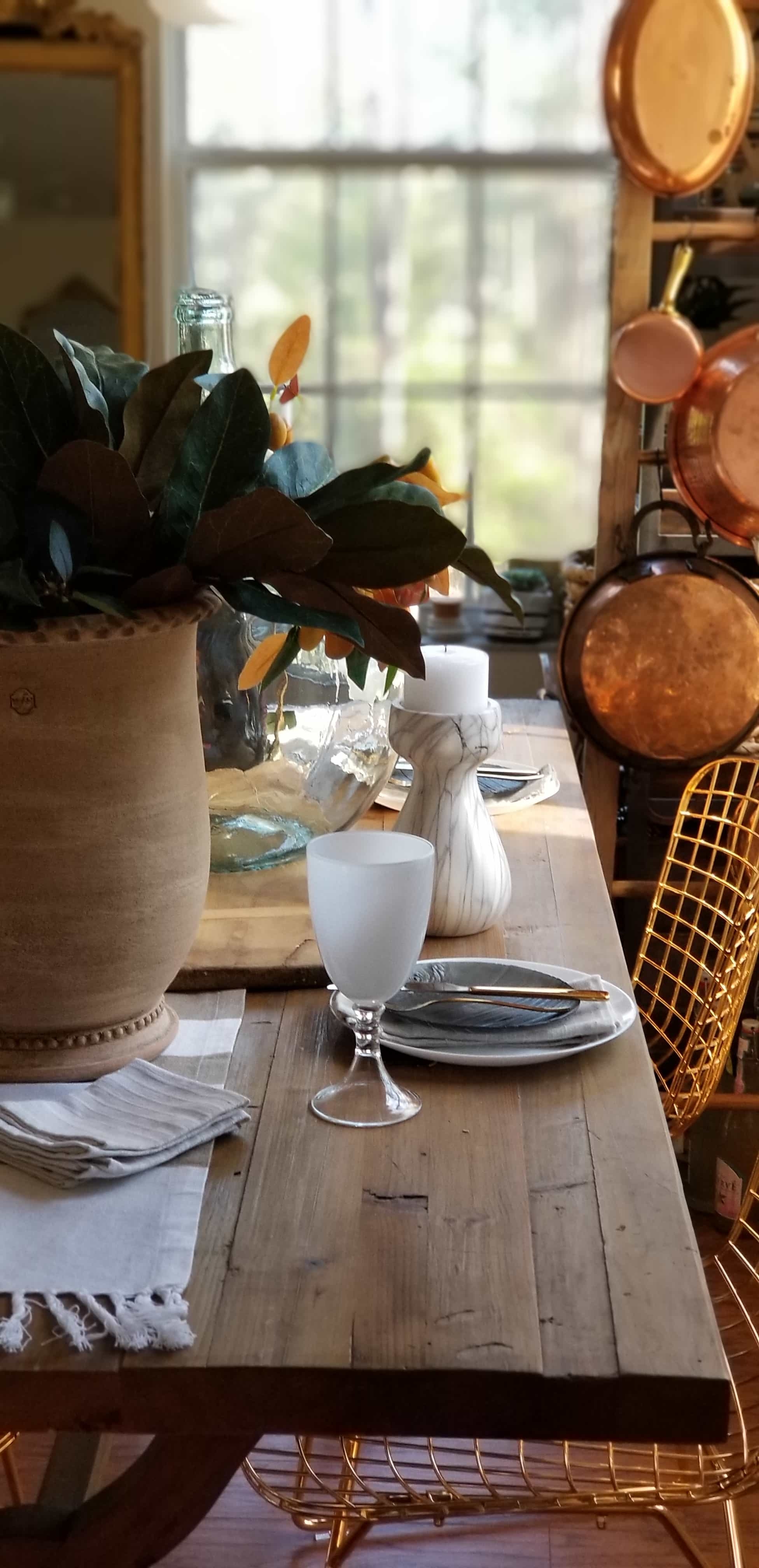 Rustic Modern European Boho Mediterranean Farmhouse Glam Dining Room Table Tablescape Joss & Main Gold Chair Terra Cotta Pots Glass Bottle Wood White Flowers Magnolia Eucalyptus Mango Stem Decor Design Inspiration Spring