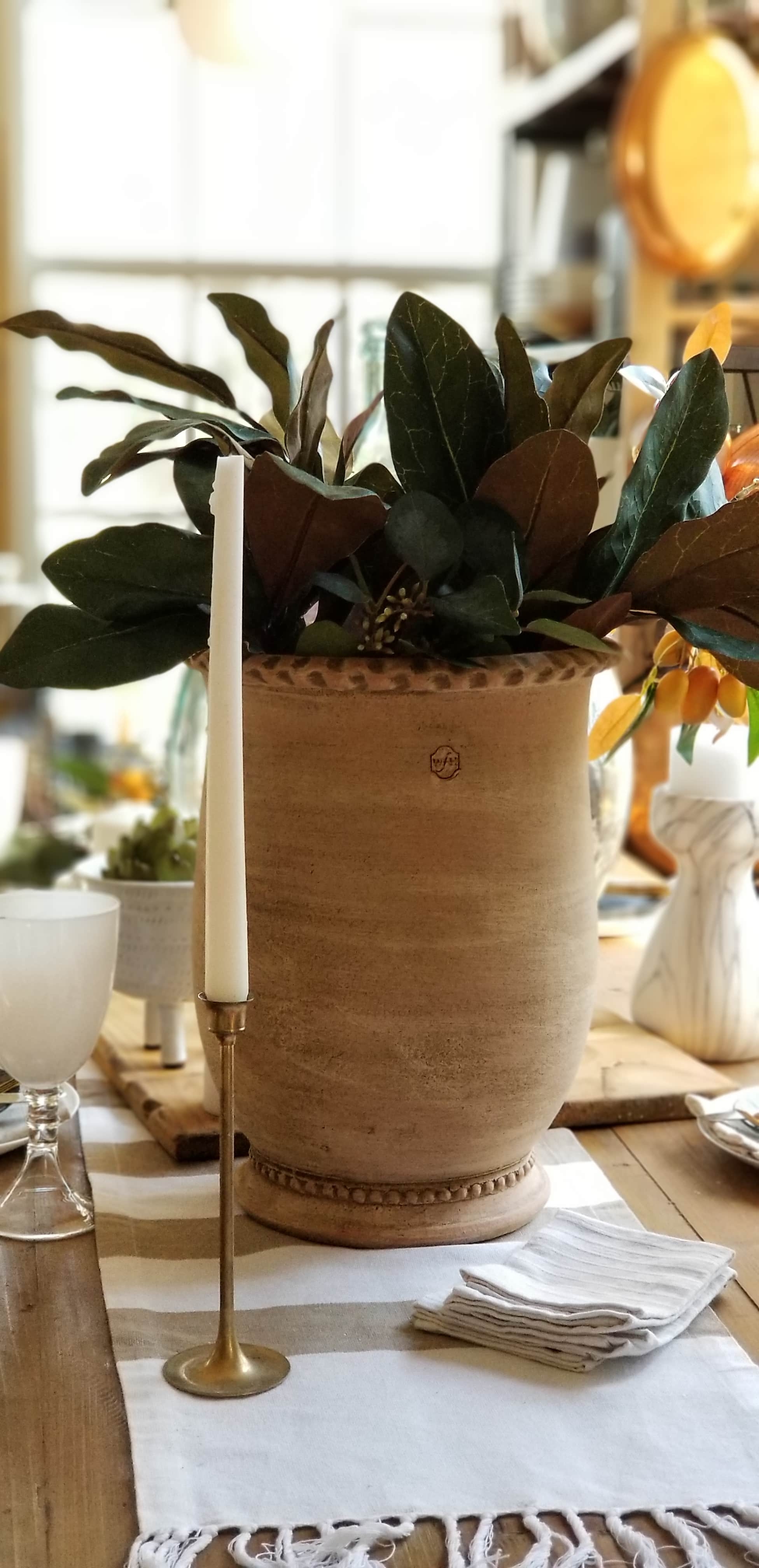 Rustic Modern European Boho Mediterranean Farmhouse Glam Dining Room Table Tablescape Joss & Main Gold Chair Terra Cotta Pots Glass Bottle Wood White Flowers Magnolia Eucalyptus Mango Stem Decor Design Inspiration Spring