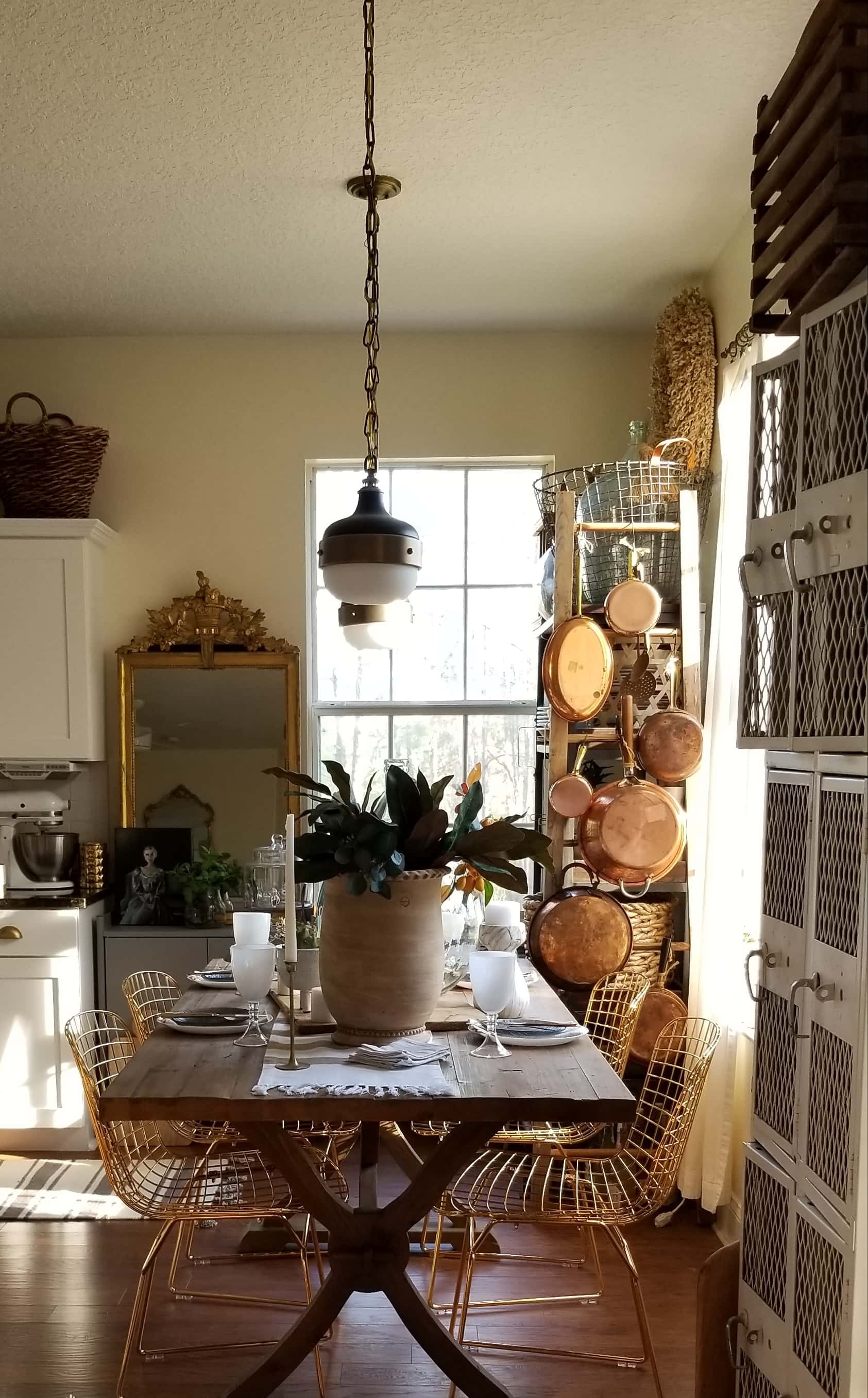 Rustic Modern European Boho Mediterranean Farmhouse Glam Dining Room Table Tablescape Joss & Main Gold Chair Terra Cotta Pots Glass Bottle Wood White Flowers Magnolia Eucalyptus Mango Stem Decor Design Inspiration Spring