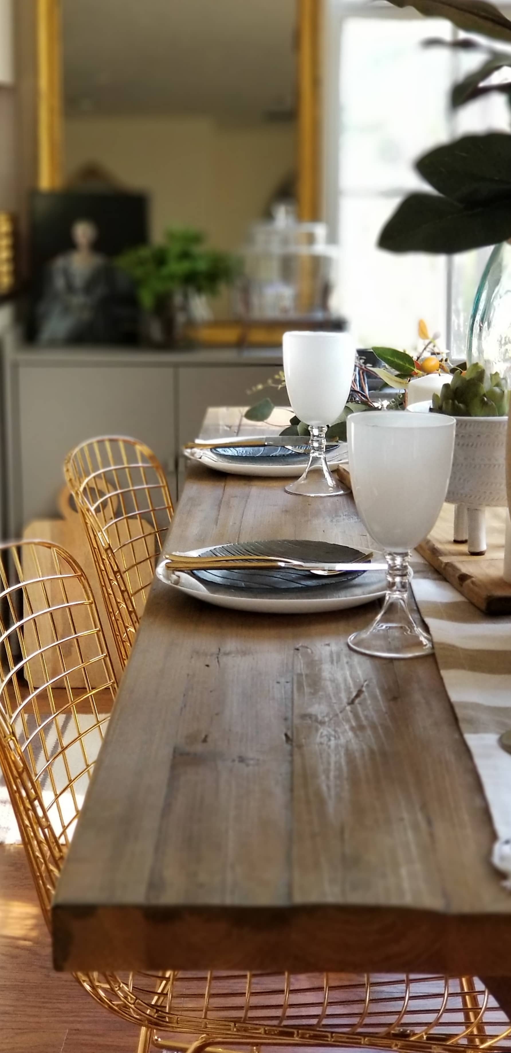 Rustic Modern European Boho Mediterranean Farmhouse Glam Dining Room Table Tablescape Joss & Main Gold Chair Terra Cotta Pots Glass Bottle Wood White Flowers Magnolia Eucalyptus Mango Stem Decor Design Inspiration Spring