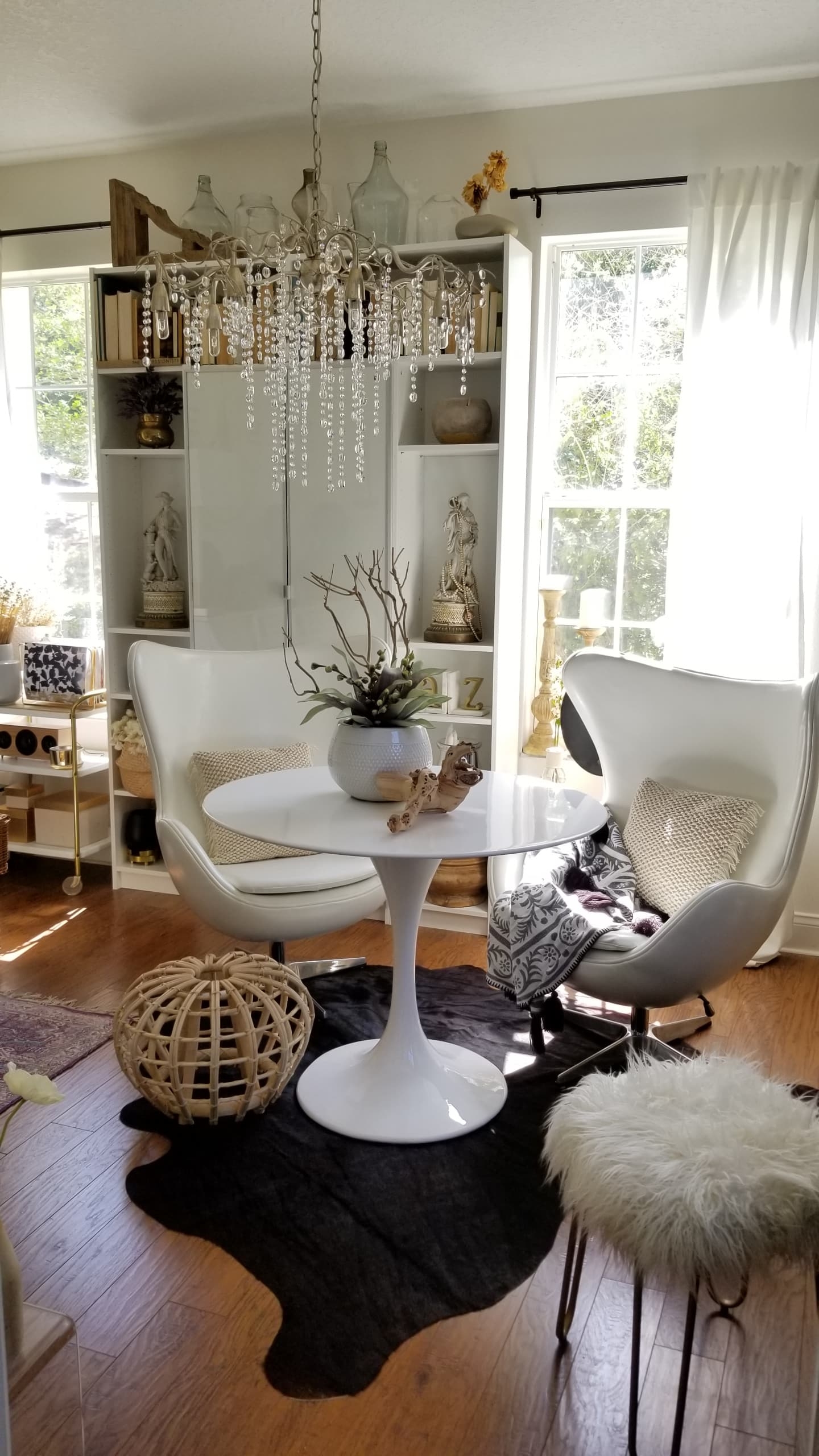 One Room Challenge Urban Chic She Den Office Makeover Industrial Glam Modern Bohemian Decor design inspiration white wood chandelier rattan ottoman tulip table scandinavian interiors open shelving tulip table egg chairs