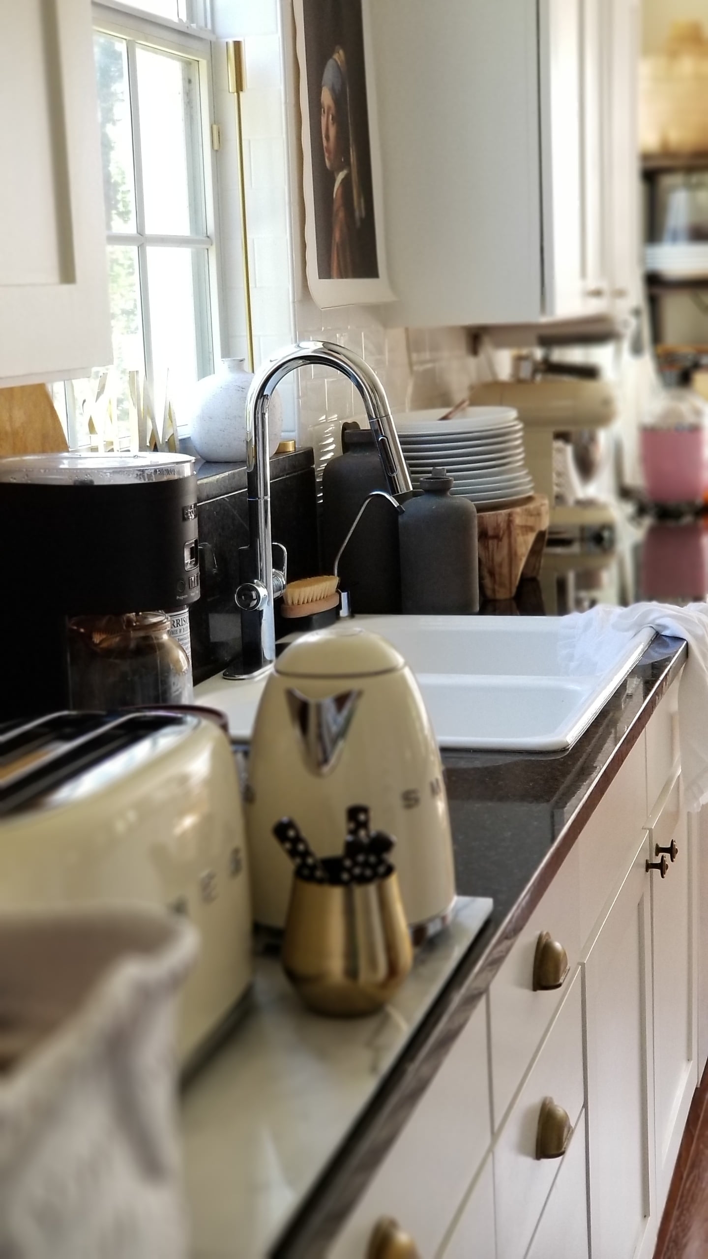 White Modern Industrial Farmhouse Kitchen Sink Faucet SMEG appliances Art Breadboards Country Living Interior Design Decor Rustic Eclectic Fixerupper Black Granite Countertops White Cabinets