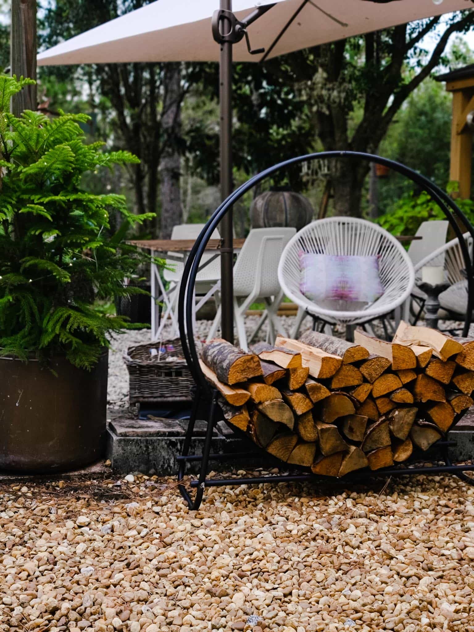 Bed Bath & Beyond Outdoor living Firepit fireplace gravel patio firelog holder firewood pine tree patio furniture bohemian eclectic rustic farmhouse scandinavian style Countryliving Better Homes and Gardens cozy fall and winter seating entertaining