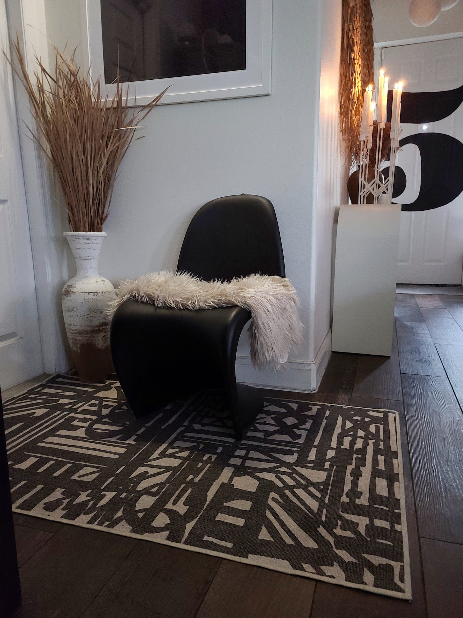 Entryway Foyer Decor with a mix of Scandinavian modern farmhouse style and a hygge cozy feel. Art, rugs and decor.