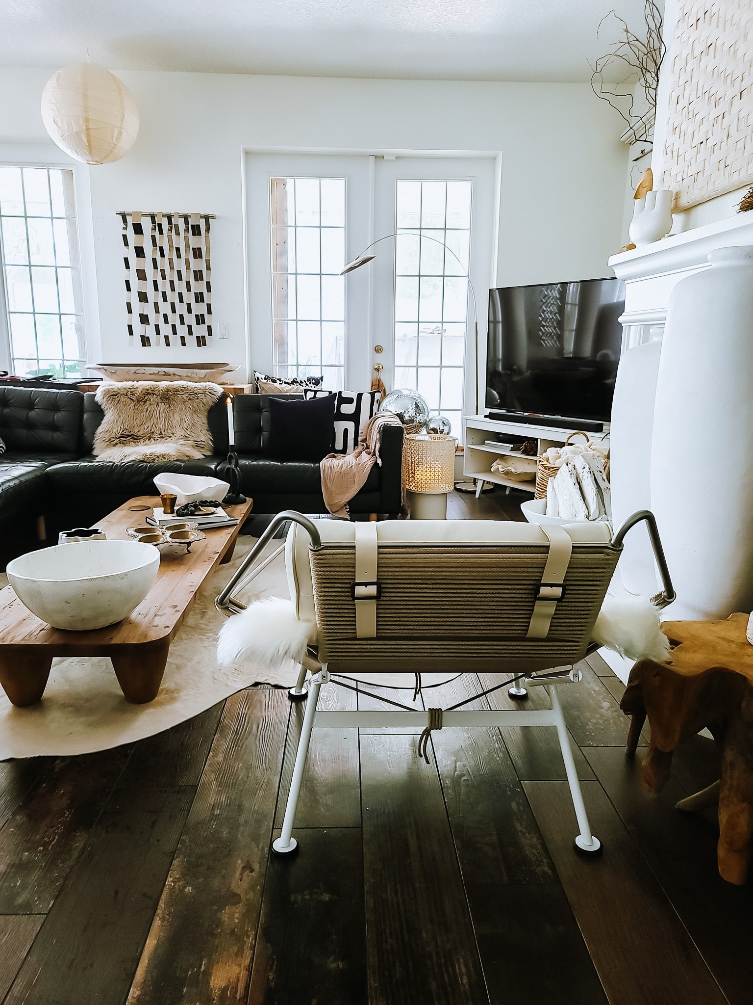 beautiful midcentury modern living room with scandinavian japandi eclectic style decor hans wegner inspired chair cozy chic modern